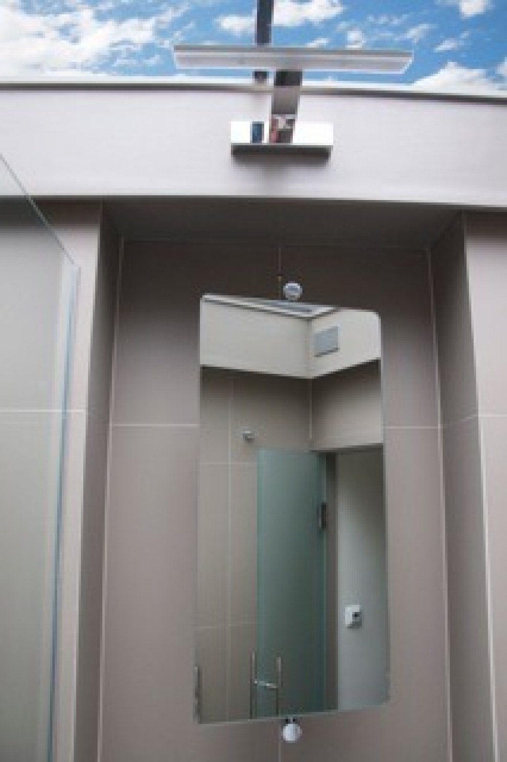 Tiny Bathroom with skylight | Astro LED light | Interior Designers