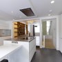 121 Brook Green | Kitchen leading to basement utility room | Interior Designers