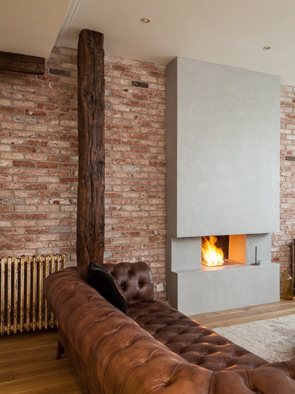 Post industrial chic in Fulham | Fireplace | Interior Designers