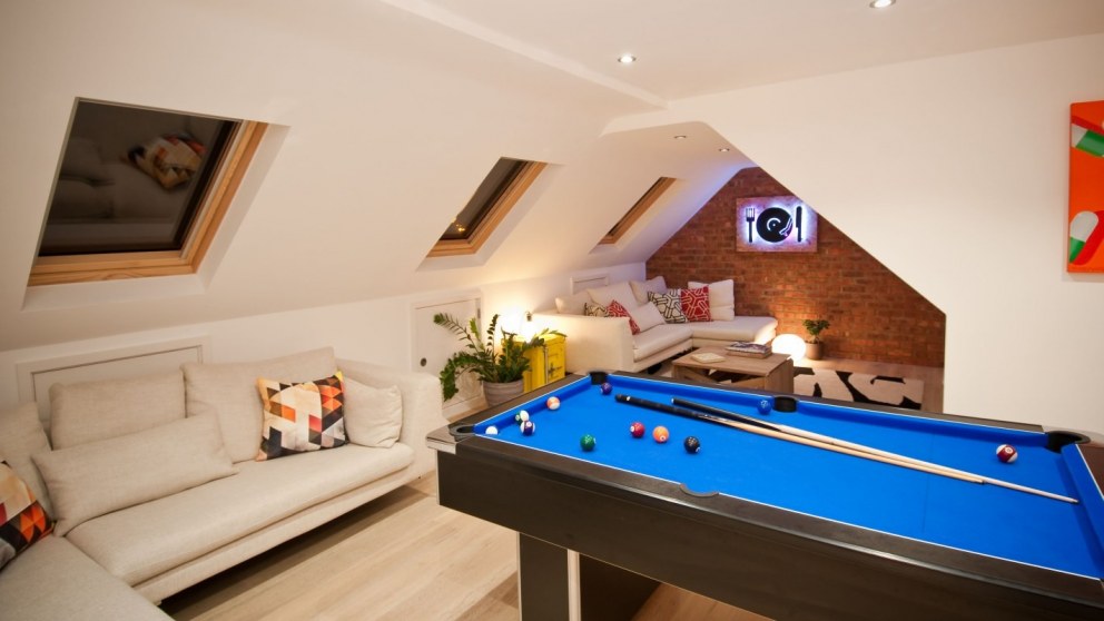 We created this hang out for our client by extending into the loft in his East London hosue | Loft 1 | Interior Designers