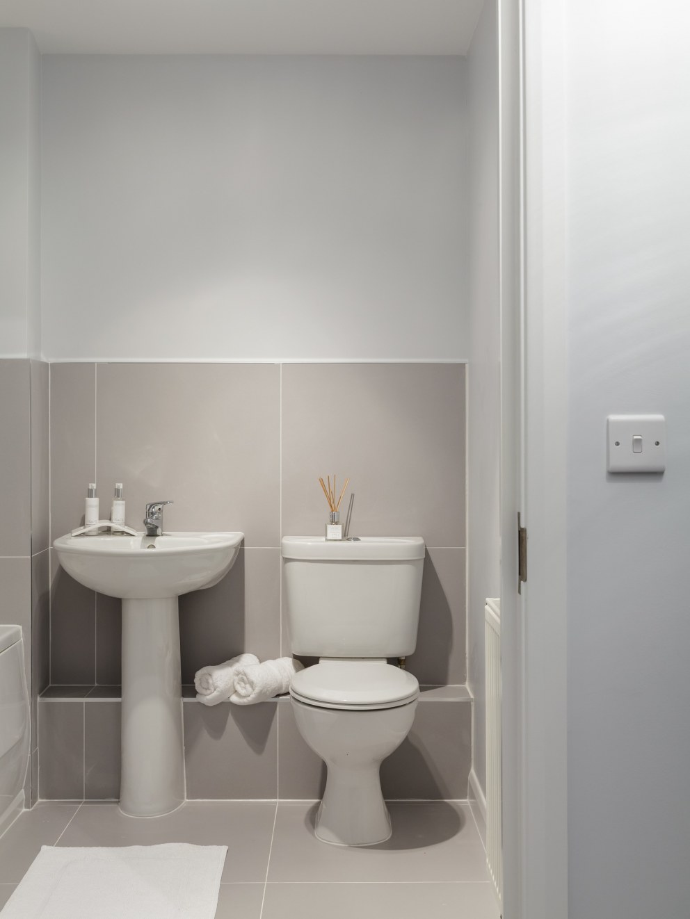 Fresh, contemporary apartment in St Albans | Guest Bathroom | Interior Designers