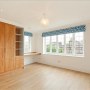 Wimbledon house | Wimbledon - double bedroom with built in wardrobes and desk/dressing table | Interior Designers