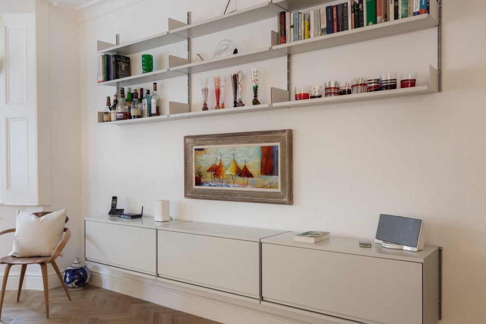 Kensington Basement | Vitsoe shelving system | Interior Designers