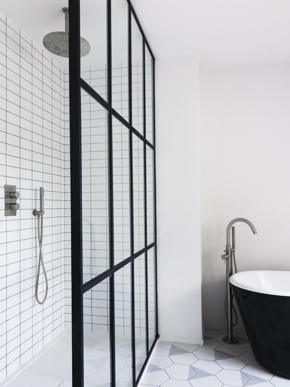 West London House  | Bathroom with bespoke shower screen and hand made tiles. | Interior Designers