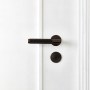Notting Hill home | Handle, architrave detail | Interior Designers