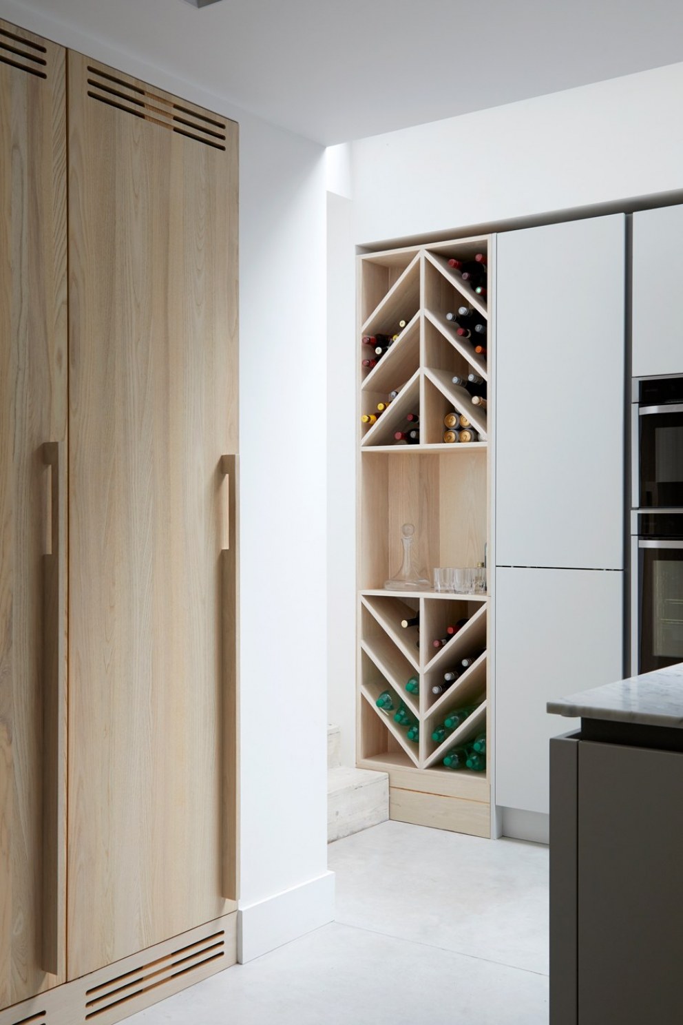 Brixton Townhouse II | Bespoke wine rack and fridge doors | Interior Designers