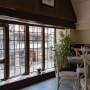 The Plough, Central Oxford | First floor corner table looking out over Cornmarket | Interior Designers