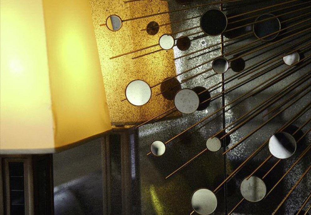 Penthouse Apartment, St John's Wood | Detail shot of striking sunburst mirror | Interior Designers