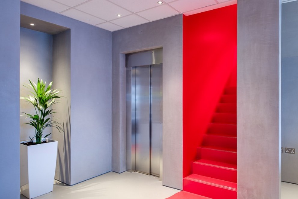 Twickenham Film Studios | Bleeding red carpet staircase | Interior Designers