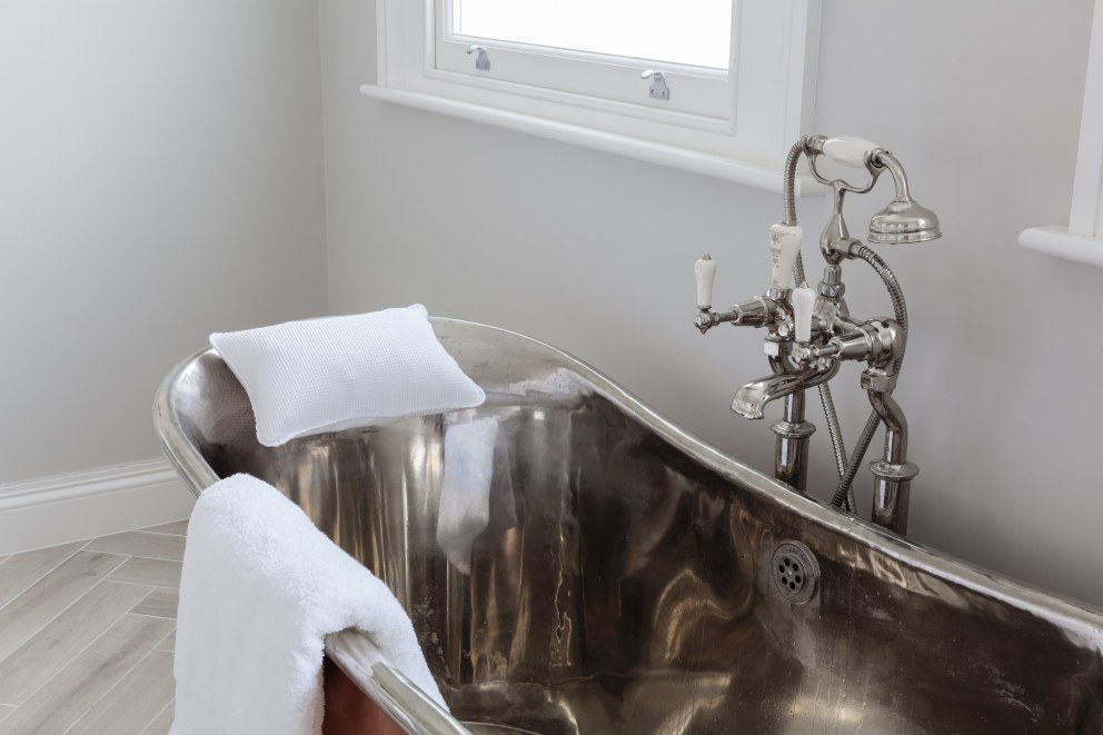 Individual Wimbledon house | Copper bath detail | Interior Designers