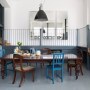 Dehavilland Studios, East London | Dining area with gallery behind | Interior Designers
