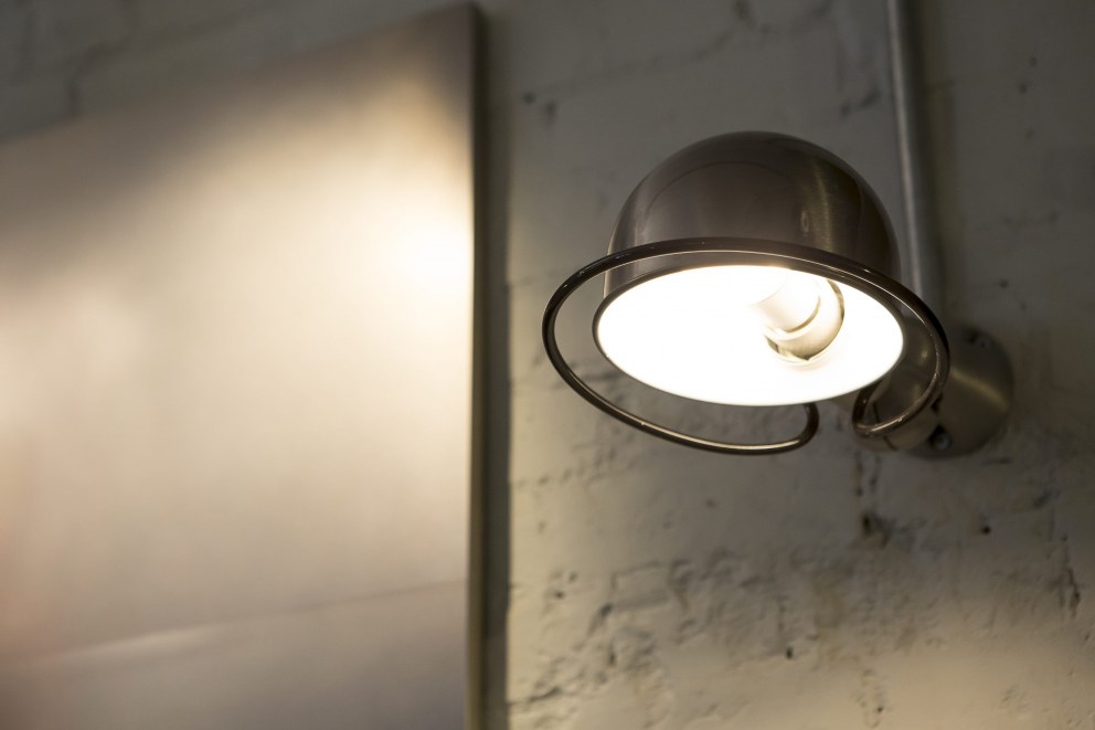 George Northwood's Hair Salon, Fitzrovia | Detail of wall light to backwash area | Interior Designers