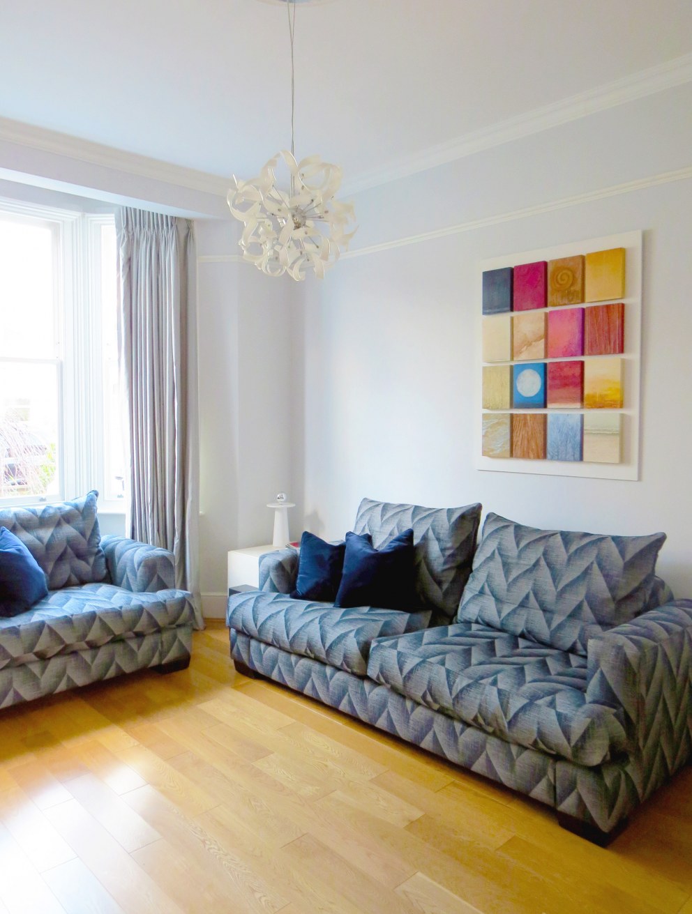 W12 home make-over | Re-upholstering the family sofa gave it a whole new lease of life. | Interior Designers
