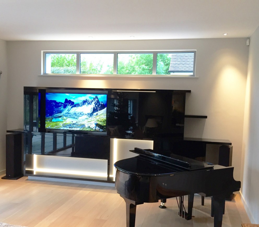 Bespoke High Gloss Media Wall | Bespoke High Gloss Media Wall with super-size TV and baby grand piano | Interior Designers