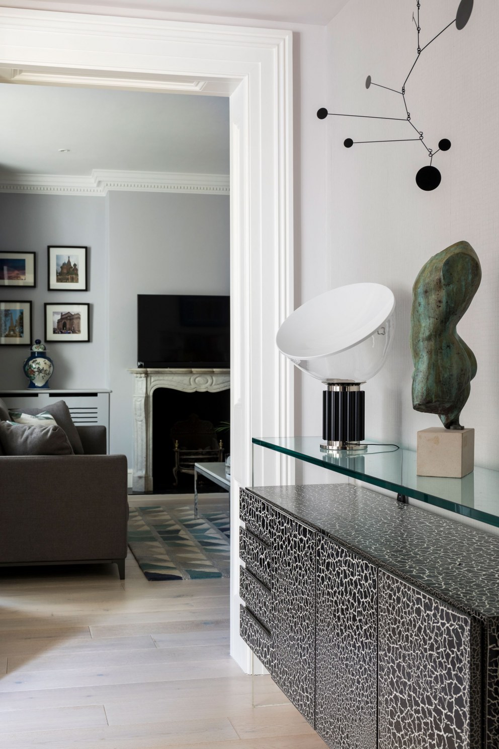 Male Oasis in Holland Park | View from hallway into the living room | Interior Designers
