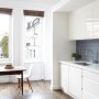 Belsize Park Residence | Kitchen and dining table | Interior Designers