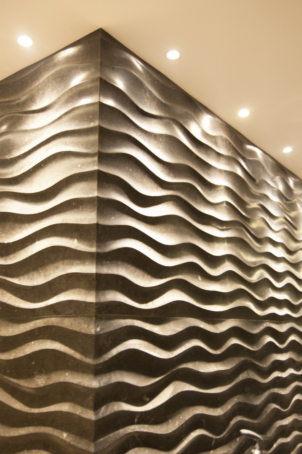 Basement refurbishment | Bespoke wall stone finish | Interior Designers