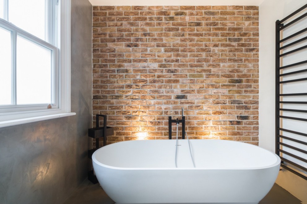 Kensal Green Home | main family bathroom | Interior Designers