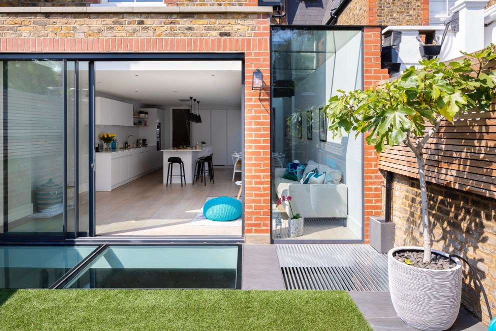 Lion House in Fulham | Rear garden | Interior Designers