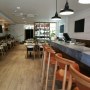 LELLO'S - RESTAURANT DESIGN | Interior view from bar towards wine store | Interior Designers
