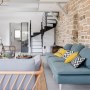 House in Brittany | Living room with steel staircase, stone wall and exposed beams 2 | Interior Designers