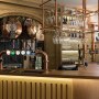 The Plough, Central Oxford | Ground floor bar showing hanging beer tanks behind | Interior Designers