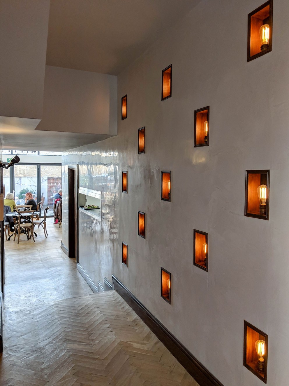 ThirtyEight, Summertown Oxford | Corridor between bar and restaurant showing wall with recessed lighting | Interior Designers