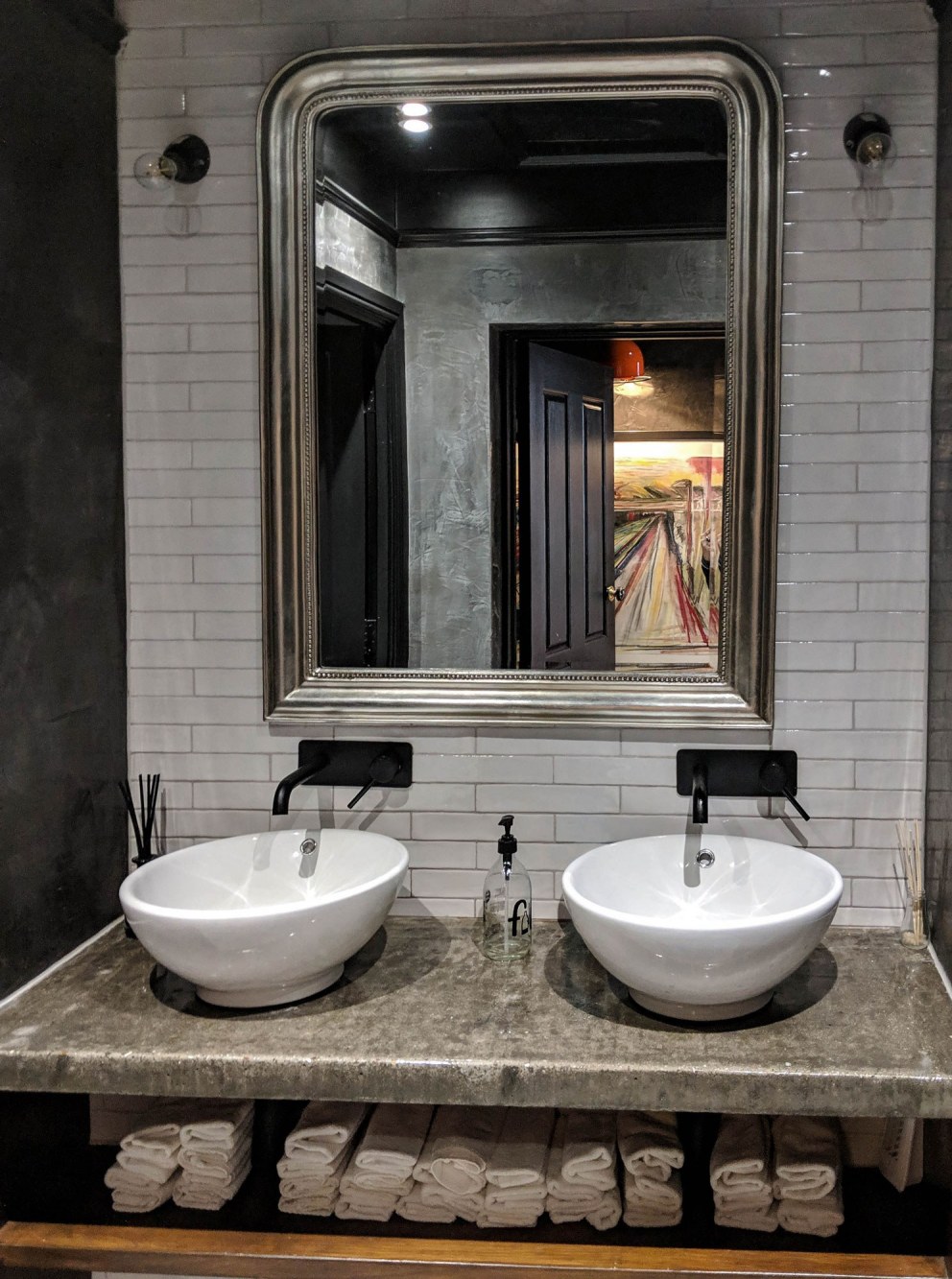 ThirtyEight, Summertown Oxford | Main bathroom with black painted walls and dark polished plaster in contrast to the light and airy bar and dining room | Interior Designers
