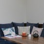 ThirtyEight, Summertown Oxford | Close up of the cosy banquette seating in the main dining room, with cushions supplied by a local textile designer | Interior Designers