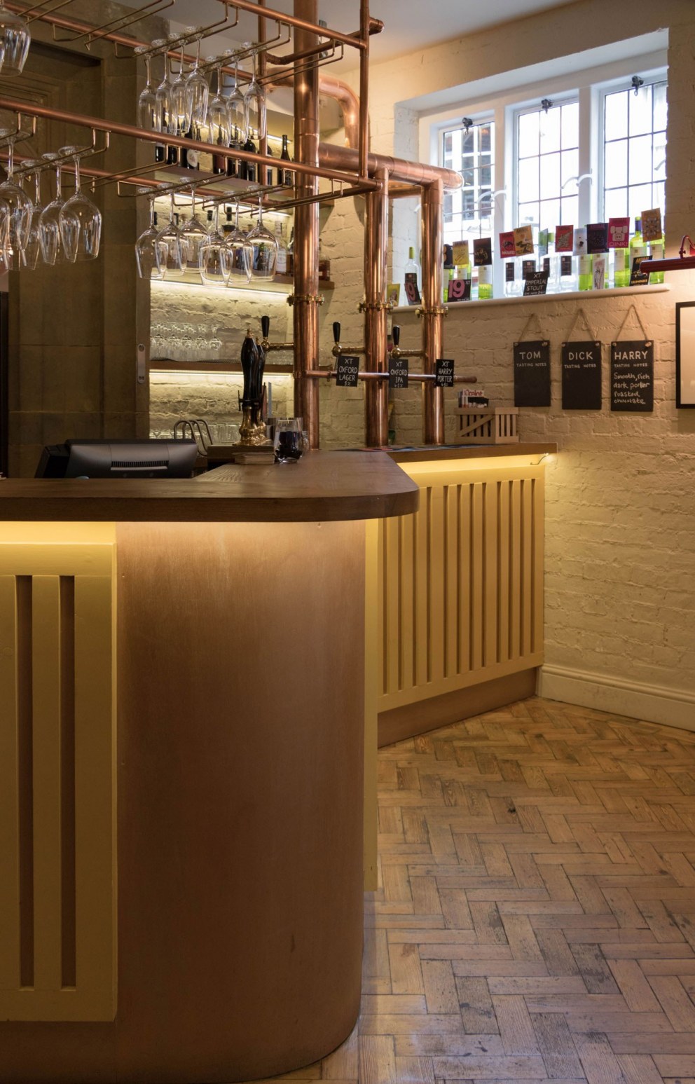 The Plough, Central Oxford | Bespoke ground floor bar with handmade brass flow pipes | Interior Designers