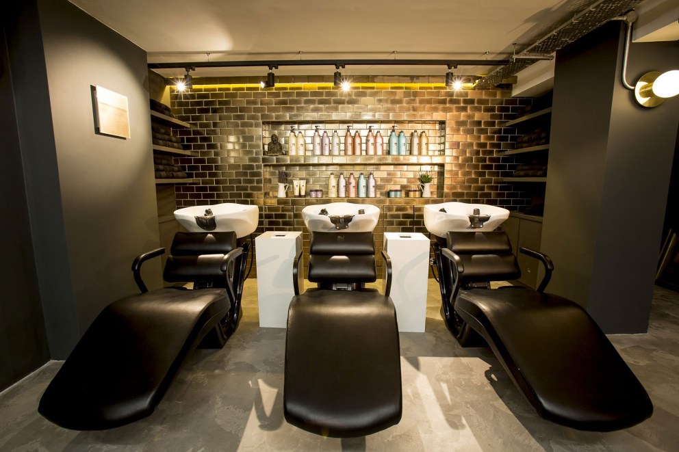 George Northwood's Hair Salon, Fitzrovia | Basement backwash showing glazed, gold tiles behind | Interior Designers