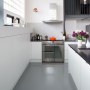 Dehavilland Studios, East London | View of kitchen cabinets and oven | Interior Designers