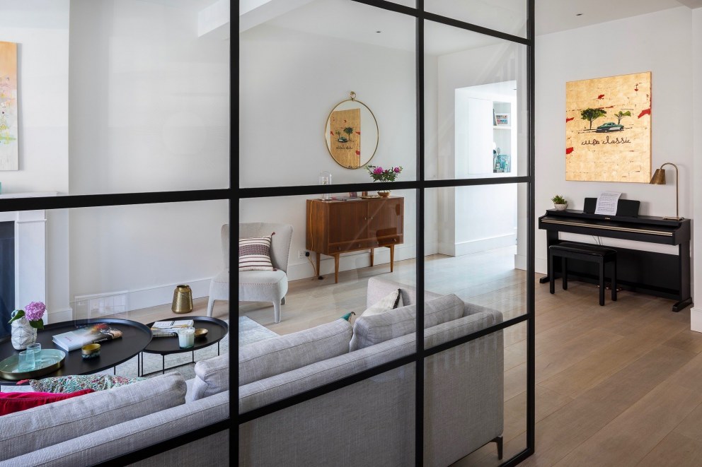 Lion House in Fulham | Living room with Crittall panel | Interior Designers