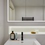 Brompton House | Bathroom lights on | Interior Designers