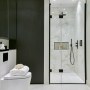 Home gym and entertainment space | Shower room | Interior Designers