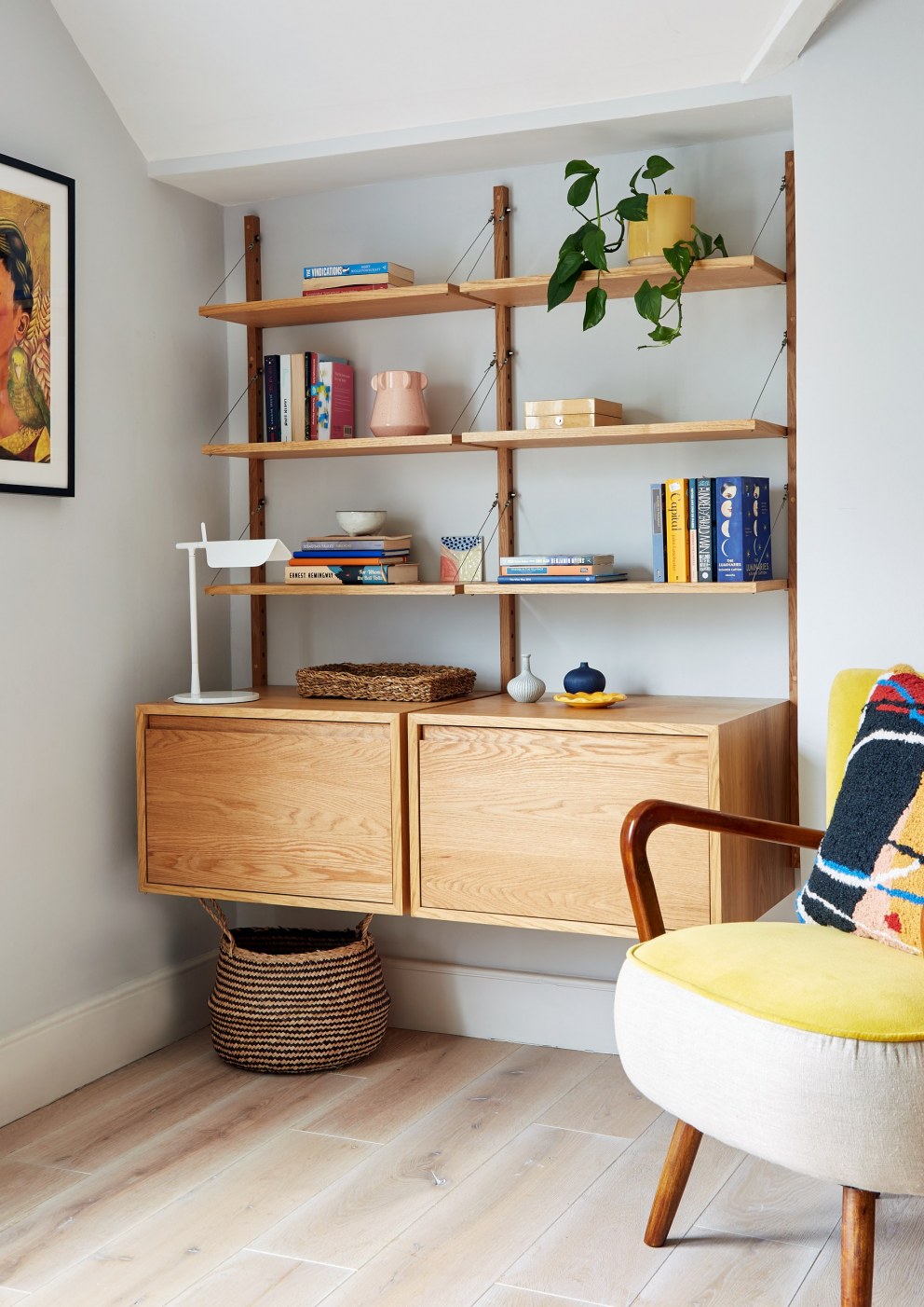 Victorian Terrace, Brockley | Bespoke shelving & bright yellow chair for client's home office | Interior Designers