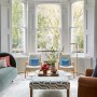 Victorian Terrace, Brockley | An elegant front room with vintage chairs & bespoke ottoman | Interior Designers