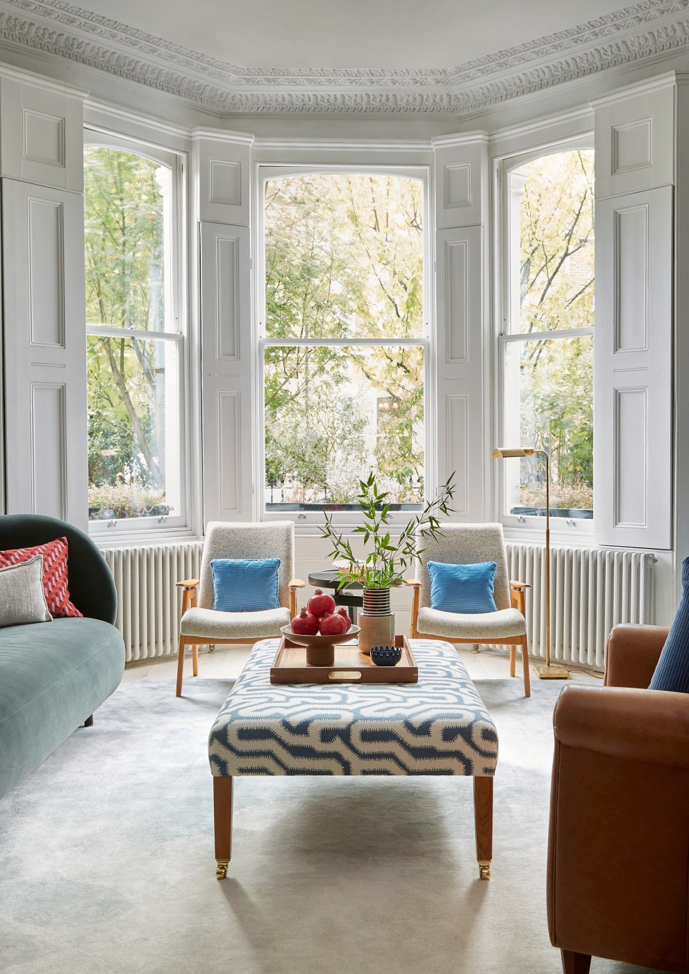 Tressillian Road | An elegant front room with vintage chairs & bespoke ottoman | Interior Designers