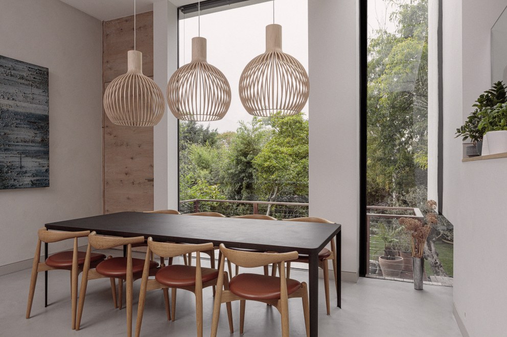 Richmond - Extension and FF&E | Contemporary dining area with suspended lights | Interior Designers