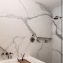 North London - Refurbishment and FF&E | Master bathroom with marble walls | Interior Designers