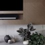 Wimbledon - New build home | Bespoke TV unit detail, chevron veneer | Interior Designers