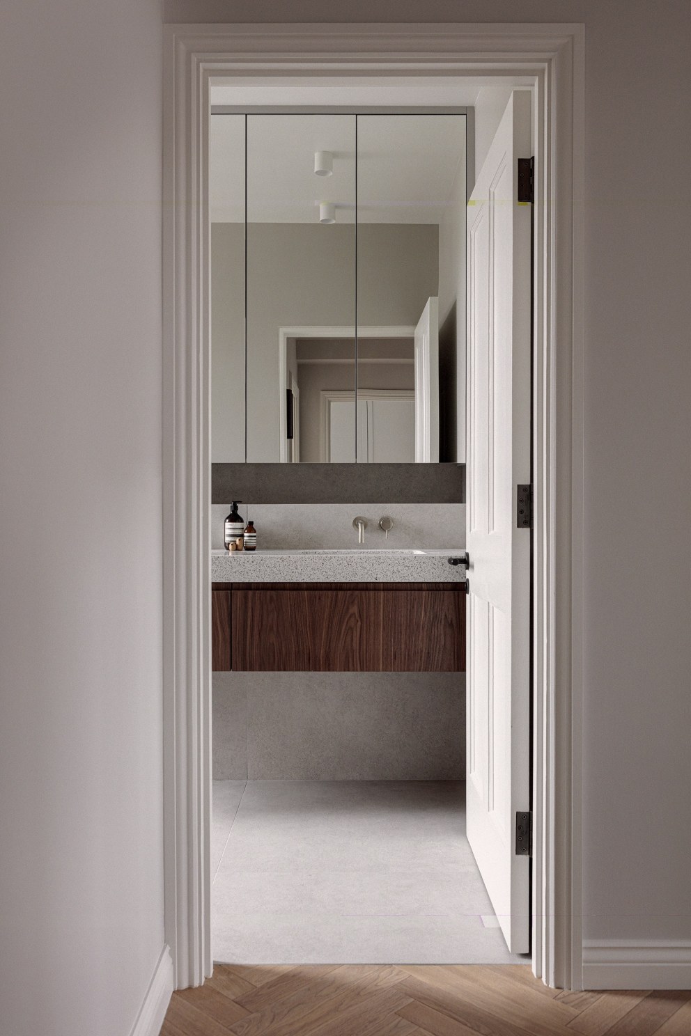 Belgravia - Refurbishment & FF&E | Bespoke bathroom vanity in walnut | Interior Designers