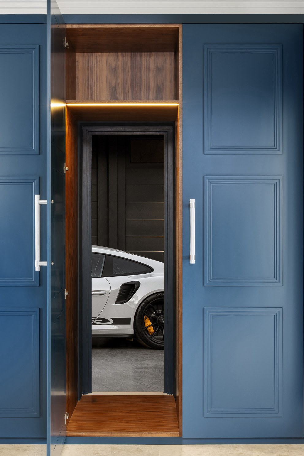 Entrance hall cabinetry - secret door into garage / Sea front family ...