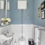 Bedfordshire Countryside Family Home | Traditional Cloakroom in Powder Blue | Interior Designers