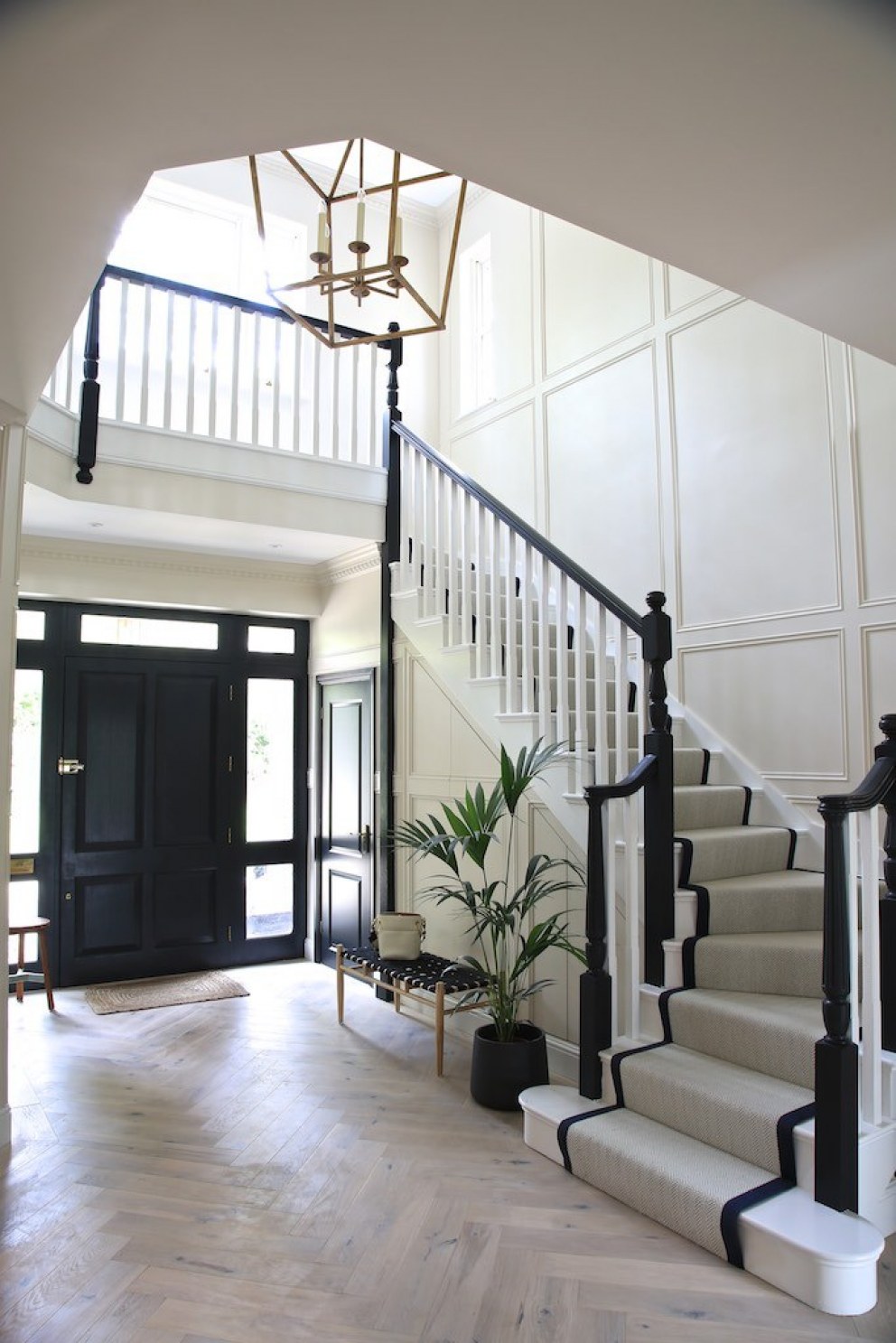 Ascot Refurbishment | Entrance staircase panelling | Interior Designers