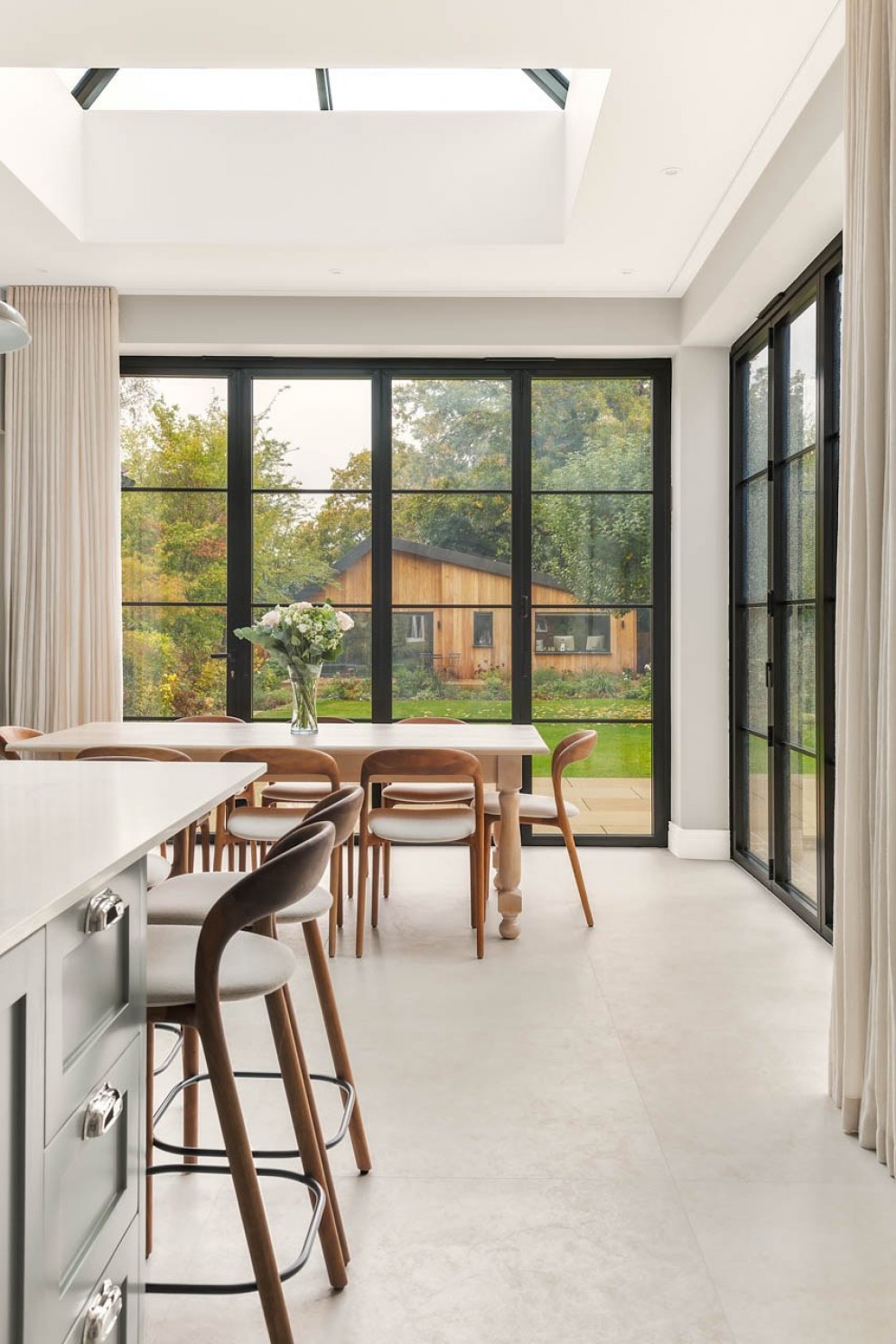 Edwardian Family Home Surrey  | Open plan Kitchen/ Diner with bifolding doors | Interior Designers