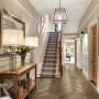 Edwardian Family Home Surrey  | Entrance Hallway with original flooring and panelling  | Interior Designers