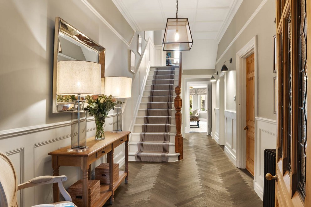 Edwardian Family Home Surrey  | Entrance Hallway with original flooring and panelling  | Interior Designers